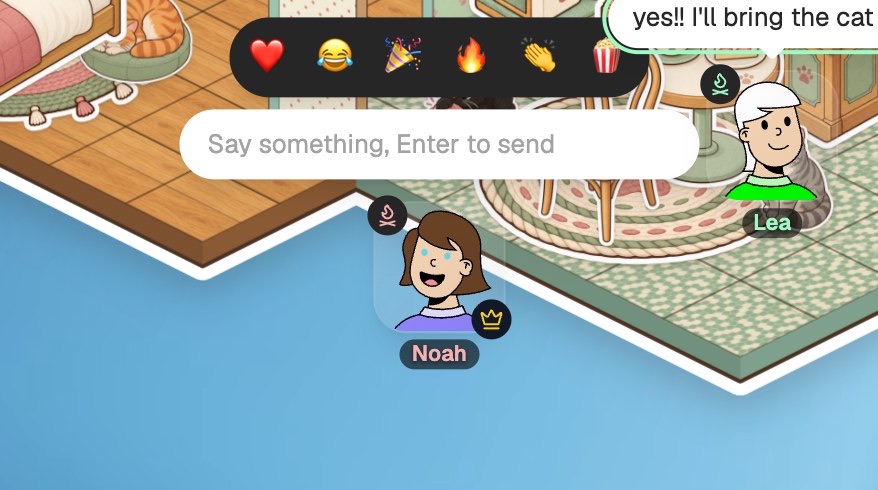 The quick reactions row above the chat line: heart, laughing, party popper, fire, clapping and popcorn